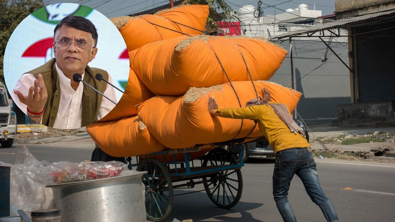 <div class="paragraphs"><p>Pawan Khera; a worker pushing a heavy cart in India.</p></div>